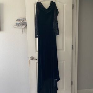 Long black velour dress, form fitting stretchy, never worn.Trumpet dress